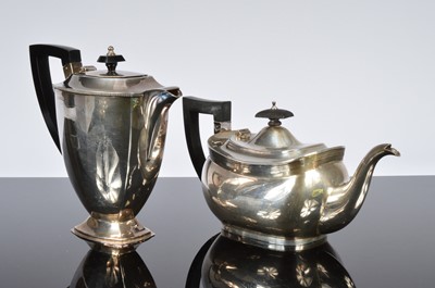 Lot 438 - A George V and later associated four piece silver tea set