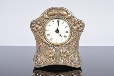 Lot 446 - An Arts & Crafts period silver mounted desk clock by William Harrison Walter