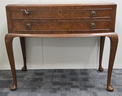 Lot 464 - A part canteen of silver plated cutlery in a two drawer chest on legs