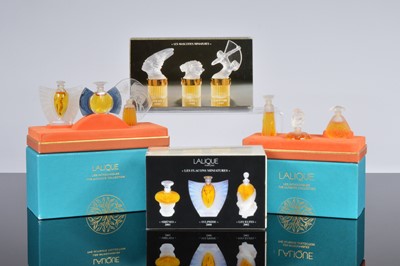 Lot 473 - Four boxed Lalique miniature fragrance collections