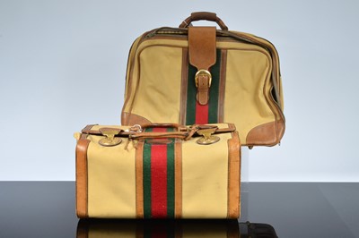 Lot 489 - A two piece leather and canvas luggage set by Gucci
