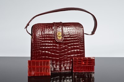 Lot 491 - A c1980s crocodile skin handbag