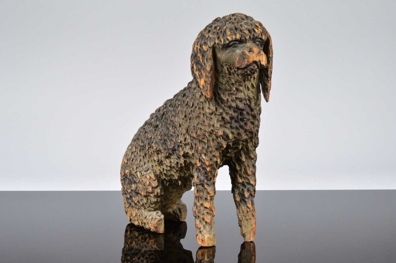 Lot 497 - An interesting antique carved wooden figure of a dog