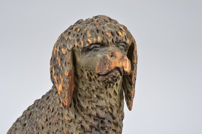 Lot 497 - An interesting antique carved wooden figure of a dog
