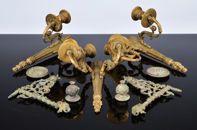 Lot 513 - A set of three gilt metal wall lights