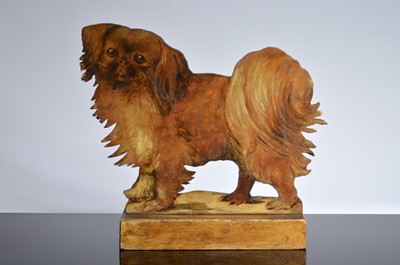 Lot 540 - A 19th century carved wooden and painted figure of a dog