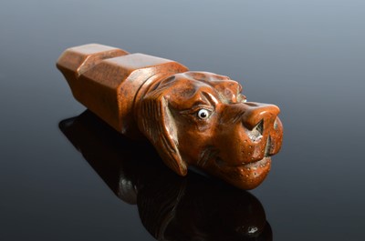 Lot 543 - A late 19th or early 20th century carved wooden dog whistle