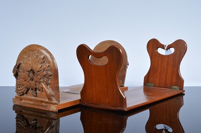 Lot 545 - Two early 20th century wooden book slides