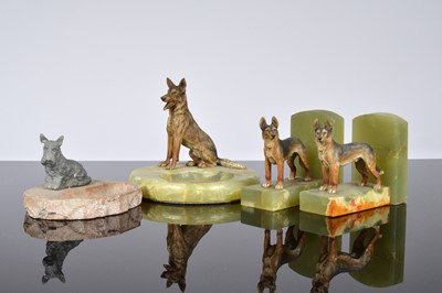 Lot 556 - A pair of Art Deco hardstone book ends and two ashtrays