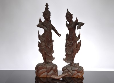 Lot 604 - A pair of late 20th century carved wooden Indonesian dancing figures