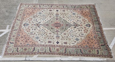Lot 699 - A large 20th century Turkish woollen carpet