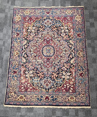 Lot 702 - A vintage Middle Eastern woollen carpet