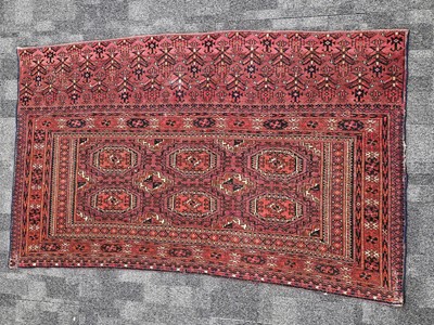 Lot 715 - A vintage Turkman Tekke Torba woollen carpet