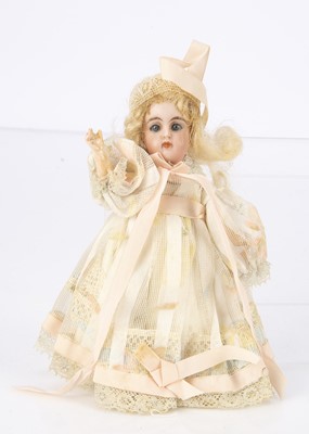 Lot 1180 - A small Kammer & Reinhardt child doll