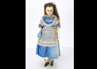 Lot 1192 - A German mid 19th century wax over composition shoulder head child doll
