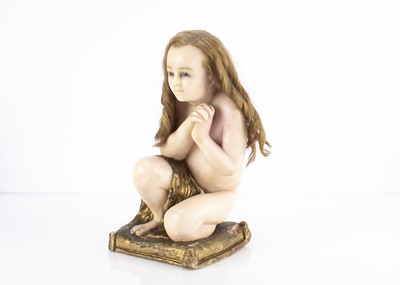 Lot 1200 - A Continental solid wax kneeling figure of the Infant St John the Baptist