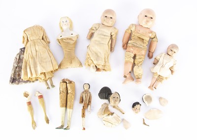 Lot 1208 - Early dolls to restore and spare bodies