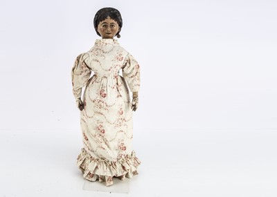 Lot 1210 - An 18th century English turned and painted wooden doll
