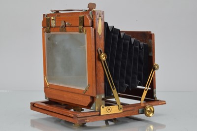 Lot 14 - An E & T Underwood ''The Field'' Mahogany & Brass Half plate Camera Body