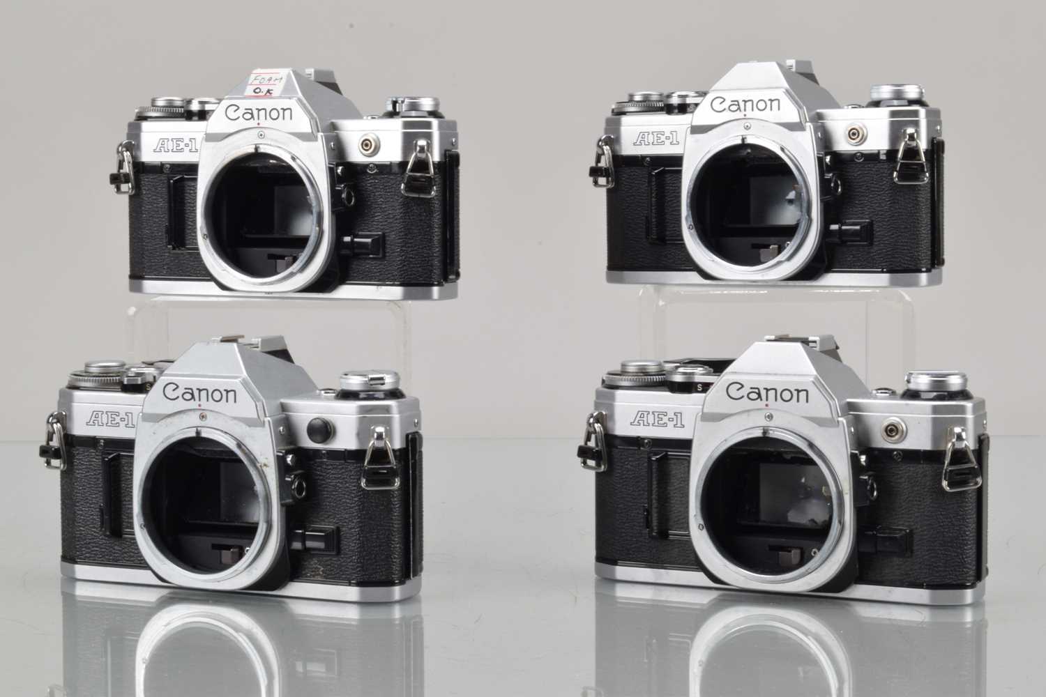 Lot 19 - Four Canon AE-1 SLR Camera Bodies