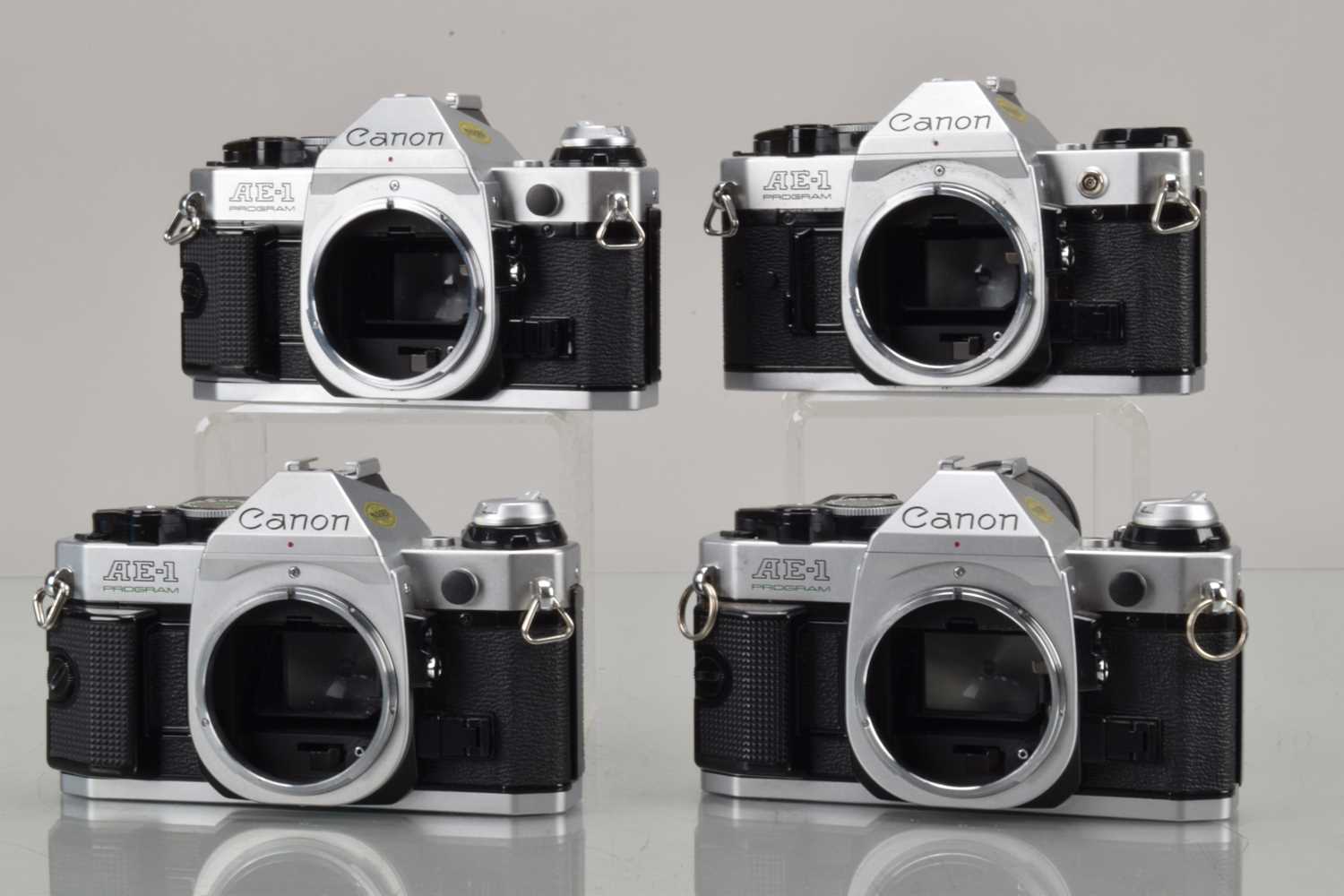 Lot 21 - Four Canon AE-1 Programme SLR Camera Bodies