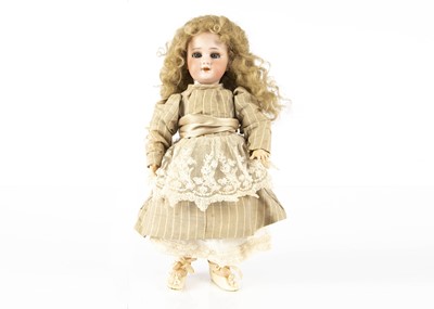 Lot 1235 - A small DEP bisque headed child doll size 1