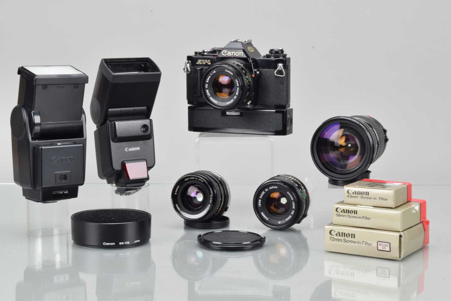Lot 34 - A Canon AV-1 SLR Camera