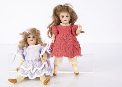 Lot 1236 - Two small bisque head child dolls