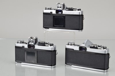 Lot 46 - Three Olympus OM SLR Cameras