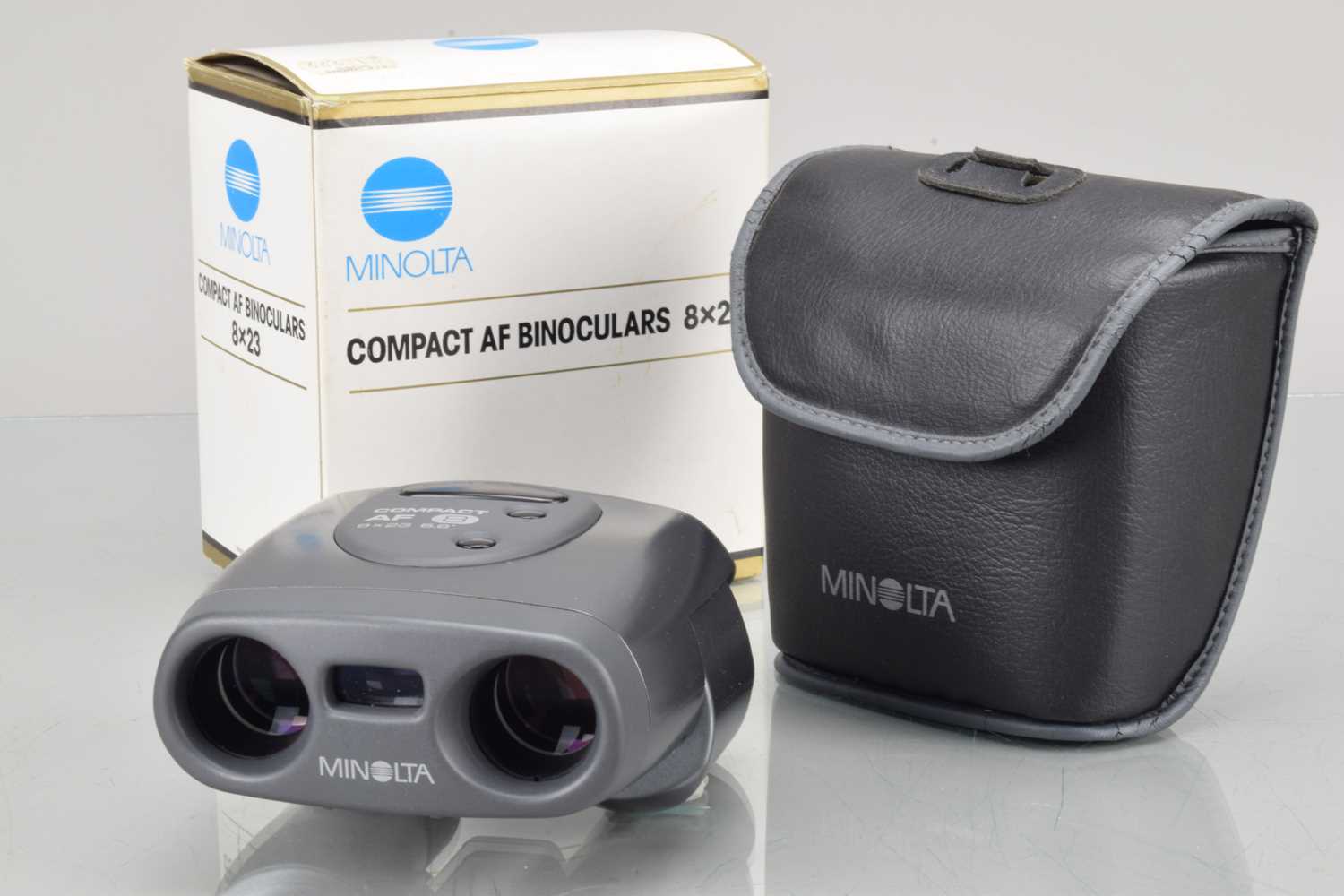 Lot 74 - A Pair of Minolta Compact 8X23 AF Binoculars