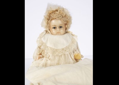 Lot 1242 - An unusual German solid wax baby doll