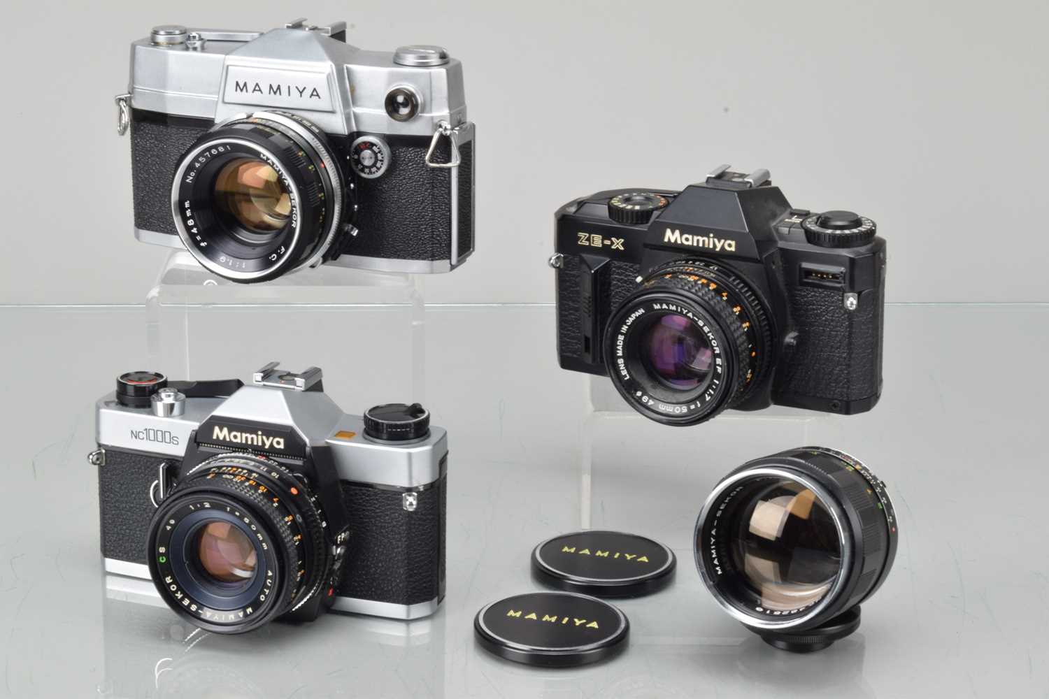 Lot 112 - Three Mamiya SLR Cameras