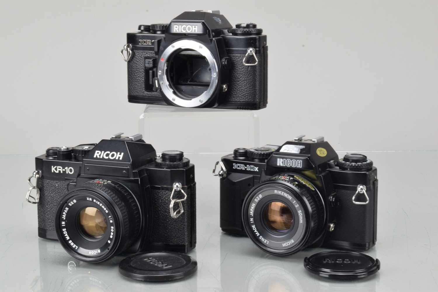 Lot 114 - Three Ricoh SLR Cameras