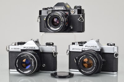 Lot 115 - Three SLR Cameras