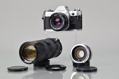 Lot 180 - A Canon AE-1 SLR Camera.