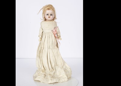 Lot 1253 - A late 19th century wax over composition shoulder head doll