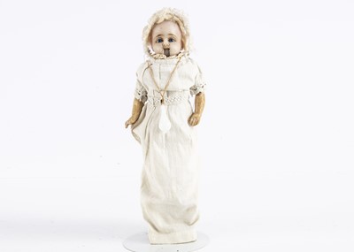 Lot 1256 - A German wax over composition feeding baby doll
