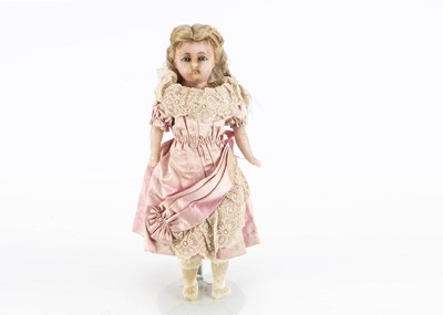 Lot 1257 - A German wax over composition shoulder-head child doll
