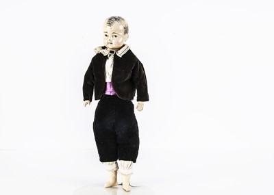 Lot 1261 - A mid 19th century German composition shoulder-head boy doll