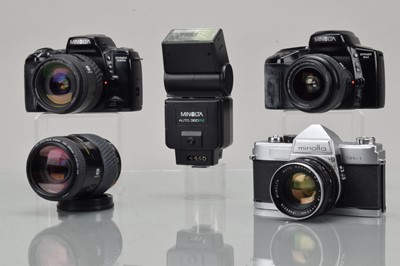 Lot 313 - Three Minolta SLR Cameras