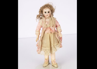 Lot 1268 - A German French style 117 child doll