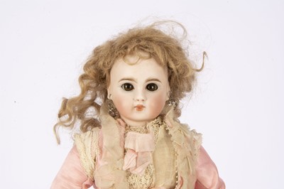 Lot 1268 - A German French style 117 child doll