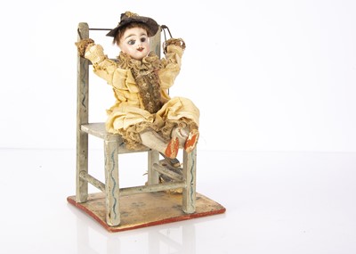 Lot 1275 - A late 19th century French tumbling acrobat toy