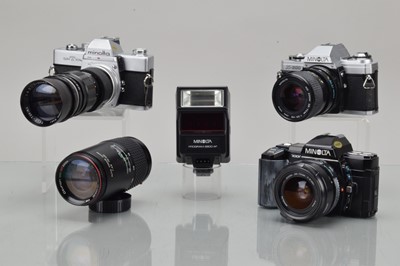 Lot 437 - Three Minolta SLR Cameras