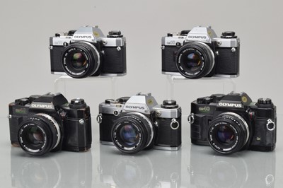 Lot 471 - Five Olympus OM SLR Cameras