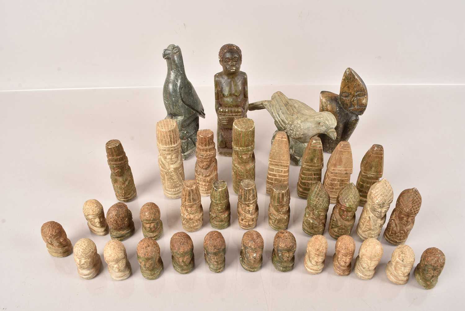 Lot 33 - An African Carved Soapstone Chess Set