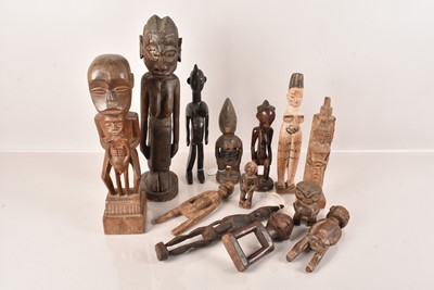 Lot 37 - A good collection of carved wooden African Figures