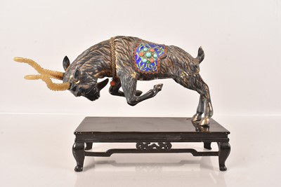 Lot 87 - A Chinese White Metal and Hardstone Figure of a Ram