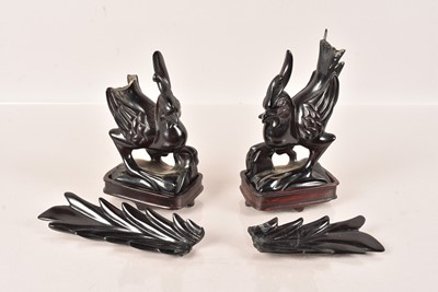 Lot 95 - Two Cherry 'Amber' style Birds on stands