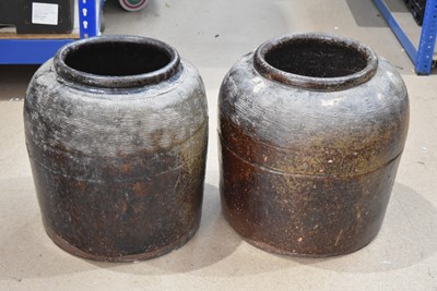 Lot 110 - A pair of large early 20th Century Chinese Stoneware Pots